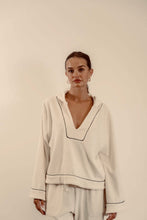 Load image into Gallery viewer, EADIE: EMPIRE BELLED HOODIE - WHITE WITH BLACK PIPING
